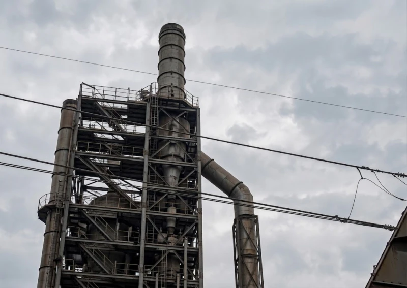 Magnetic Plume Abatement system in full operation at antibiotic pharmaceutical manufacturing facility in Datong Shanxi Province showing completely invisible stack exhaust with zero white plume after activation